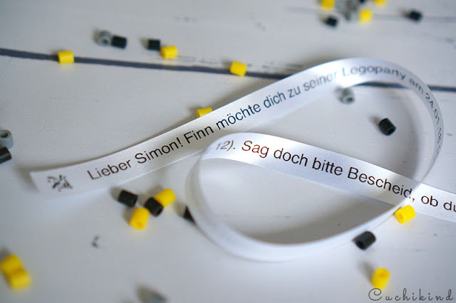 Schleifenband beschriften