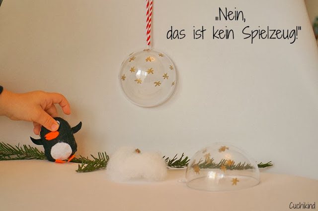 Pinguin in der Kugel