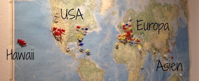 Pinnadeln auf der Weltkarte